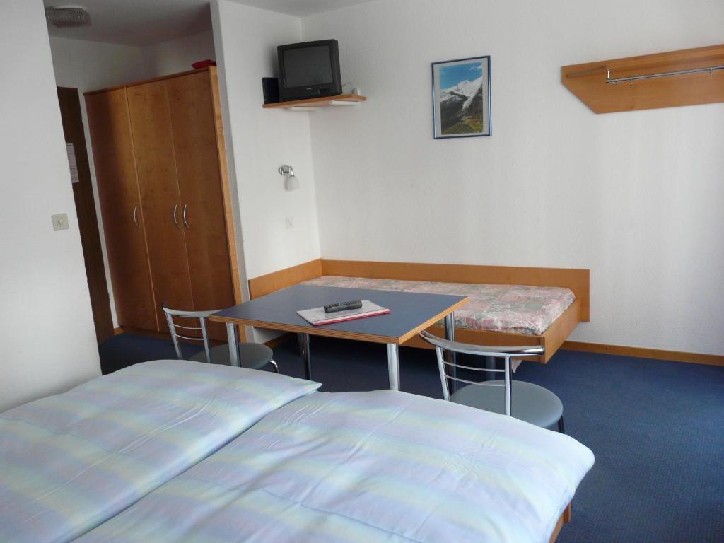 Hotel Garni Domino Saas-Fee Habitación foto