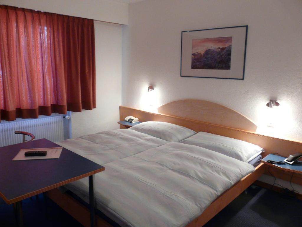 Hotel Garni Domino Saas-Fee Habitación foto