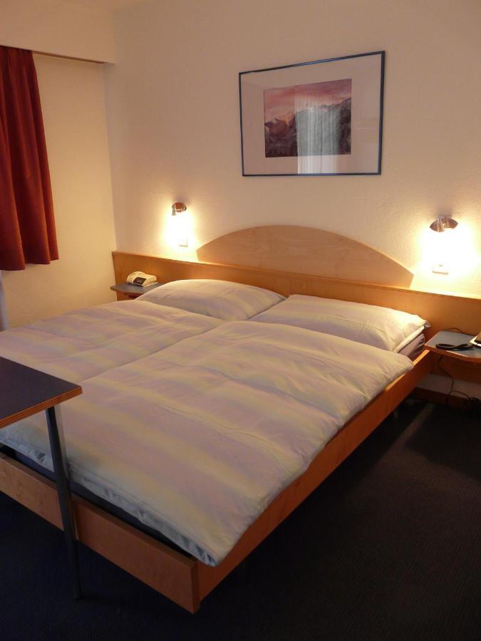 Hotel Garni Domino Saas-Fee Habitación foto